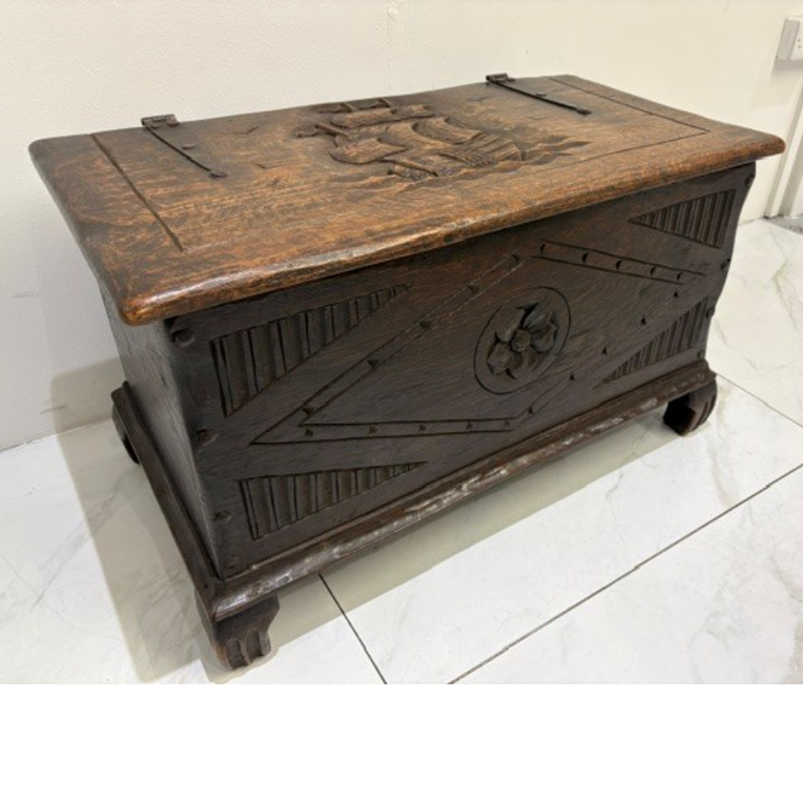 Antique Oak Chest Featuring A Carved Sailing Ship Motif - VIN1259B Antique Oak Chest Featuring A Carved Sailing Ship Motif - VIN1259B